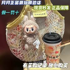 动霸王茶姬微笑江豚托特包是什么材质